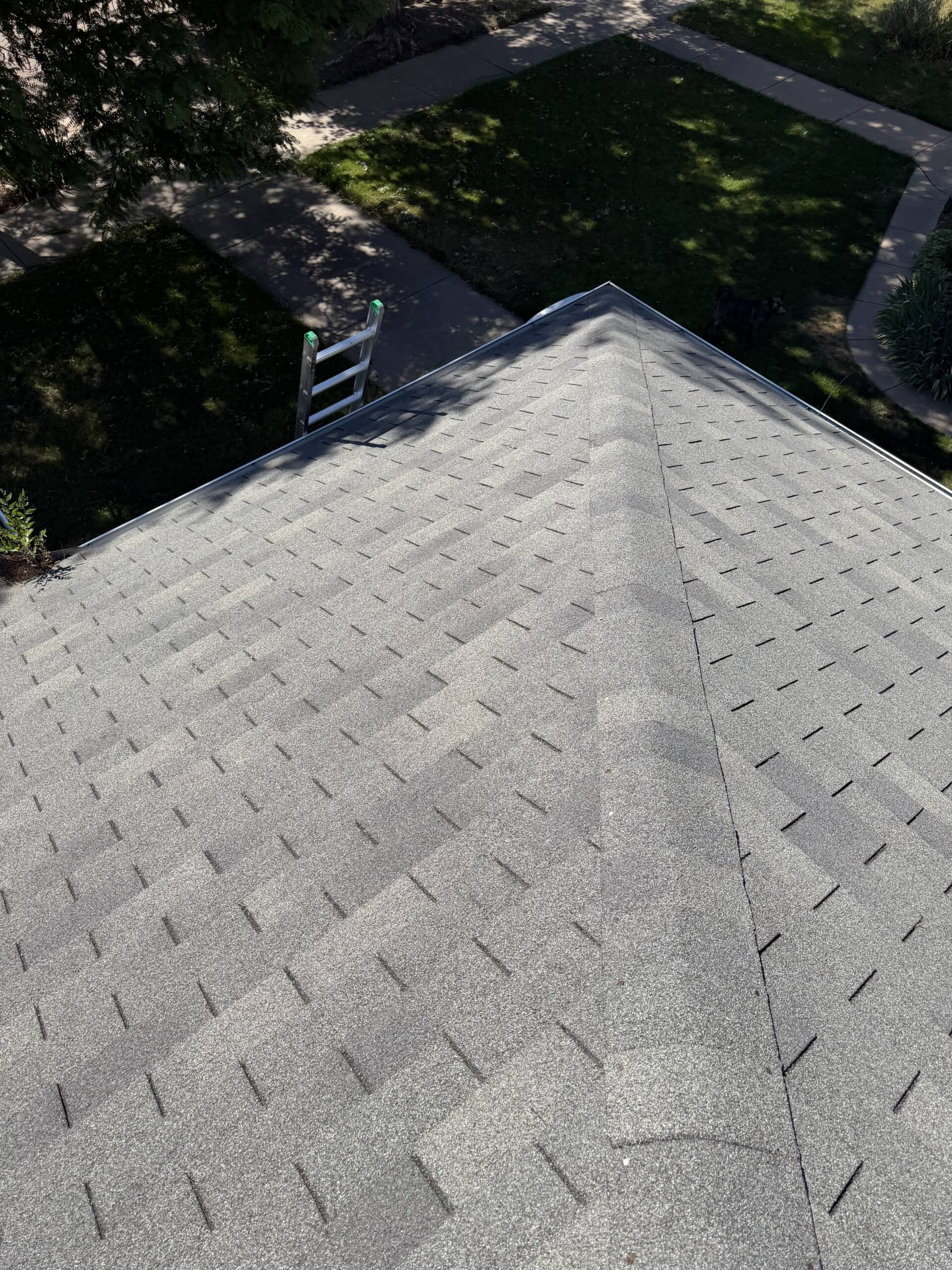 Roof ridge and asphalt shingles inspected during an RTII roof inspection in Colorado Springs, Colorado